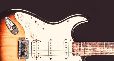 Guitar strings, close up. Electric Bass Guitars. Electric guitar. Close up of music guitar. Stringed electric musical instrument. Musical instrument for rock, blues, metal songs