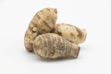 Taro or taro root or Arbi on white background, it's have full on calcium and iron