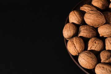 Walnuts on a dark background. Nutcracker close-up.