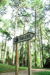 sign indicating the place to park the trailer on a camping site