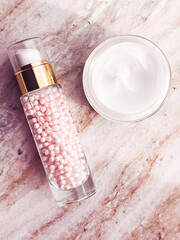 Skincare cosmetics, face cream moisturiser jar and golden serum emulsion in bottle, beauty product...