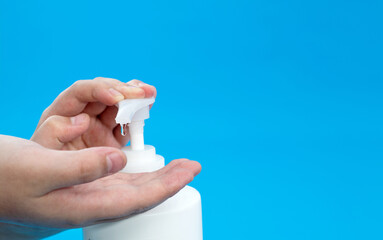 Woman hands using liquid soap