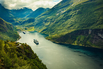Fototapeta na wymiar Cruise ships on fjord, Geiranger Norway.