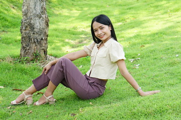 Asian woman tourists smile happily.