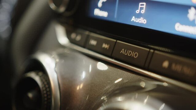 Car interior, control buttons, acoustic system and control system. Modern car dashboard. Car detailing. display with blank screen. Modern car interior details. Interior of prestige modern