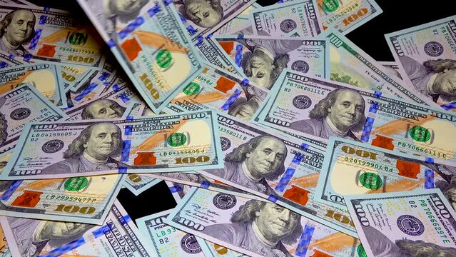 100 Dollar Bills, Portrait of president Benjamin Franklin on US dollar bills. Business concept