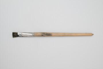 artistic paint brush painted tip on white background