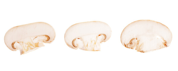 set of cut champignons isolated on white background
