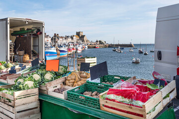 Fototapeta na wymiar Vegetable stall in the market of the port of Barfleur in Brittany, France