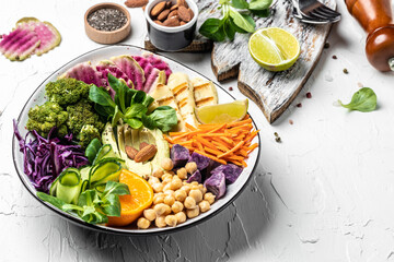 Ketogenic diet food, chicken fillet, quinoa, avocado, avocado, feta cheese, quail eggs, strawberries, nuts and lettuce. healthy meal concept, Long banner format. top view