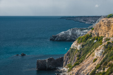 Fototapeta na wymiar The coast at the cape Fiolent. Top view on sea and rocks. Crimea