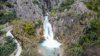 Fototapeta na wymiar Cascada de cañón del tipo torrencial en Alicante, Estret de les Penyes o Estrecho de las Peñas
