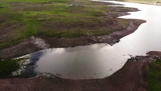 Aerial view of Alqueva Dam artificial lake from village Aldeia da Luz, Alentejo tourist destination region, district of Evora, Portugal.