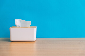 Tissue box on wooden table