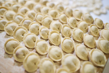 dumplings are stacked in even rows. Ural traditional food. Russian national dish