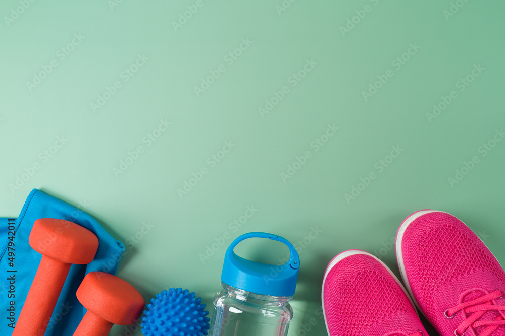 Canvas Prints Fitness background with dumbbells, bottle of water, sport shoes and towel. Top view with copy space