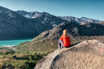Trekking on Norway fiord - Besseggen trail. Looking towards Memurubu (Gjende Lake).
