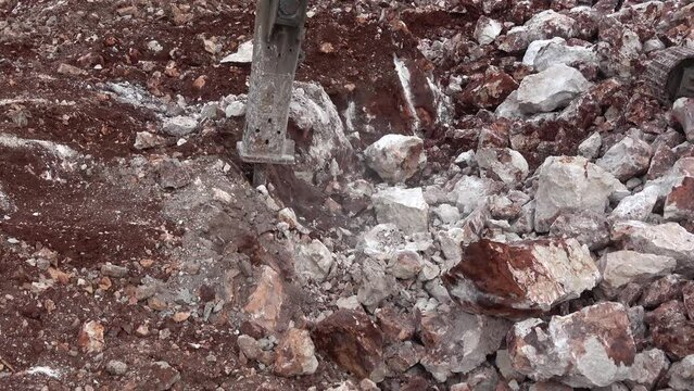 Kas, Turkey - 25thth of February 2022: 4K Driller of construction machine working on rocky ground
