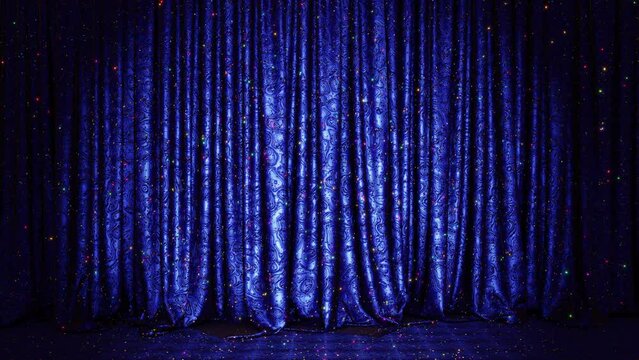 Realistic 3D animation of the stylish and fancy blue metallic shining textured stage curtain with blue silk carpet floor and colorful glittering sequins rendered in UHD with alpha matte