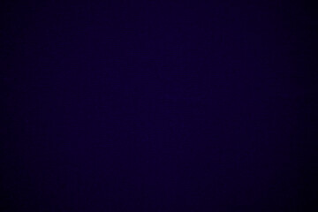 Dark blue velvet fabric texture used as background. Empty dark blue fabric background of soft and smooth textile material. There is space for text..