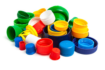 Colored plastic caps from bottles of water isolated on a white background. Close-up, top view....