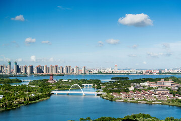 Fototapeta premium Modern buildings and park in the city