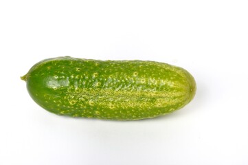 Small cucumber on a white background