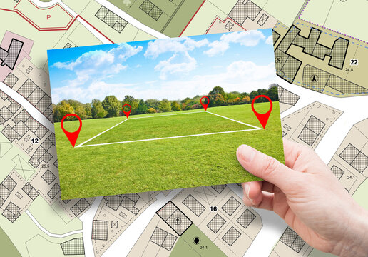 Land plot management - real estate concept with a vacant land on