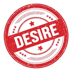 DESIRE text on red round grungy stamp.
