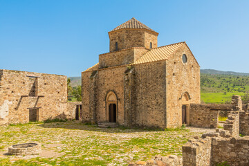 Fototapeta na wymiar Ruins of Panagia tou Sinti ortodox Monastery with temple in the center, Cyprus