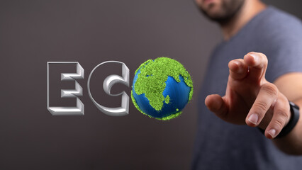 Eco word on the background of green leaves of carrots. plantation