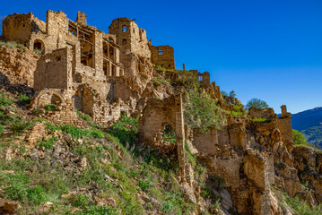 Fototapeta na wymiar Ruins of the abandoned mountain village of Gamsutl, Republic of Dagestan, Russia