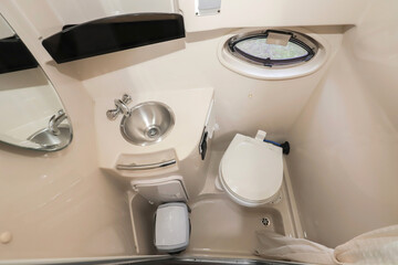 Interior restroom toilet inside motor boat