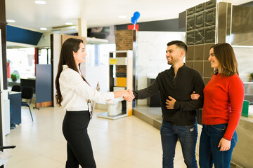 Clients making a deal with a salesperson