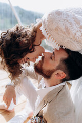 Bride and groom are kissing. Eco wedding in bogo and lifestyle. 