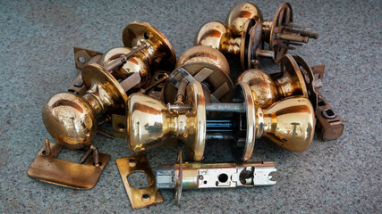 Close up from old golden colored door knobs