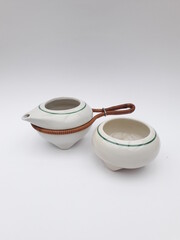 Mid-century modern porcelain coffeepot and sugar container isolated