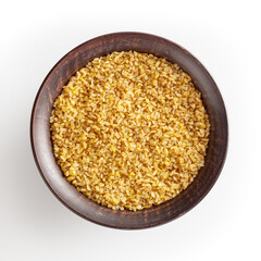 Dried bulgur in ceramic bowl isolated on white background with clipping path