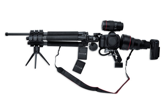 Weapon shaped camera equipment arrangement illustrating modern media warfare using photography for fighting the enemy