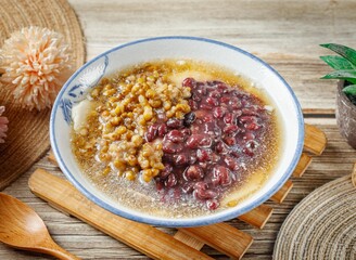 Tofu with seeds and beans in a dish side view on wooden table taiwan food