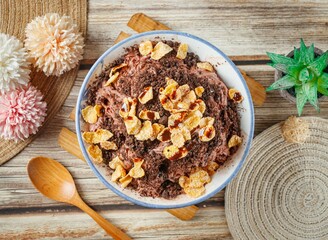 Chocolate Black Forest cake in a dish top view on wooden table taiwan food