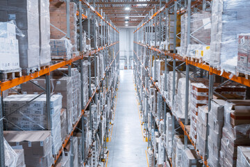 warehouse with filled shelves. high shelves with goods. storage and transportation.