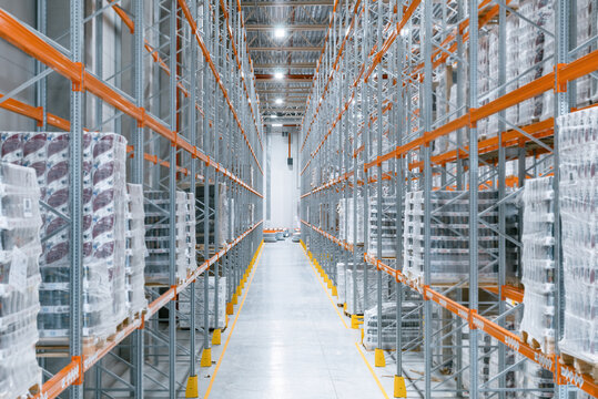 warehouse with filled shelves. high shelves with goods. storage and transportation.