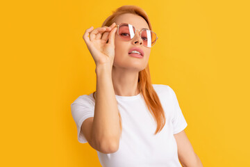 portrait of smiling young woman in glasses, style