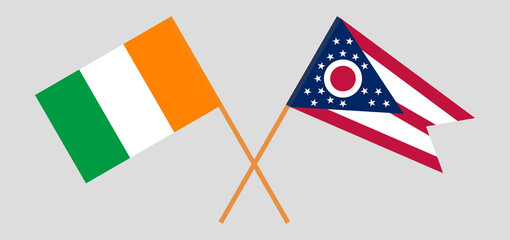 Fototapeta na wymiar Crossed flags of Ivory Coast and the State of Ohio. Official colors. Correct proportion