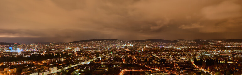 large panorama of the city of Zurich at night