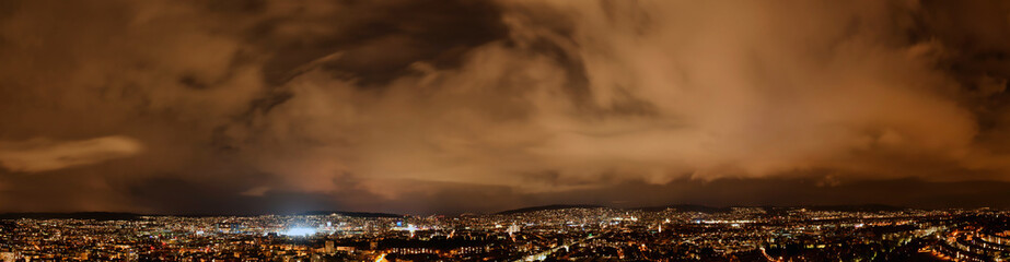 large panorama of the city of Zurich at night