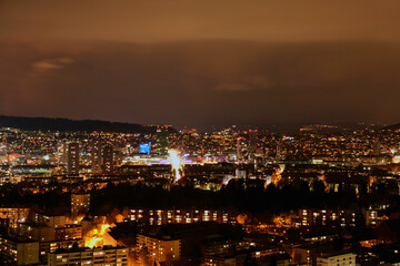 Fototapeta na wymiar Panorama of Zurich city at night with Hardbrücke