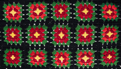 Crocheted colorful blanket patterned yarn texture background