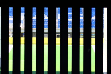 暗闇から見るサッカー場スタジアムピッチ
Soccer field stadium pitch seen from the dark
